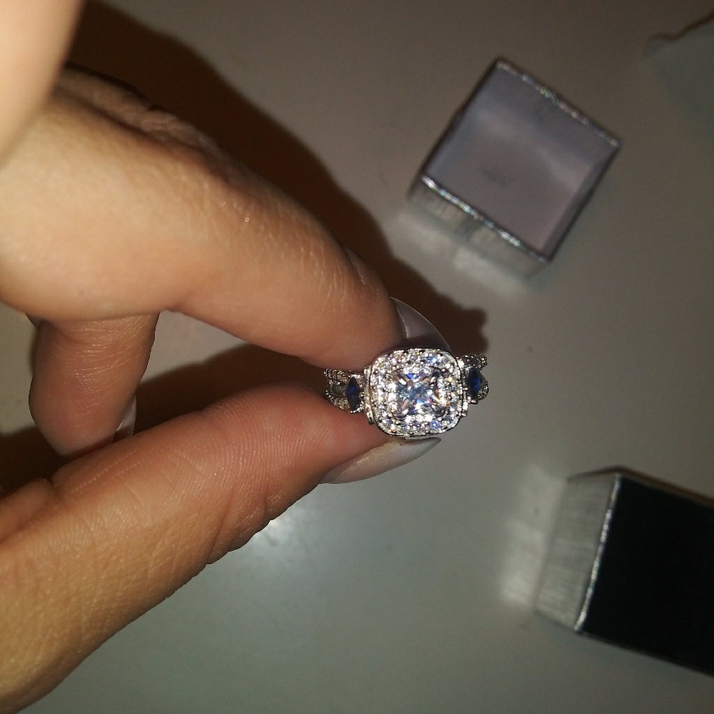 Lab created white sapphire and silver ring